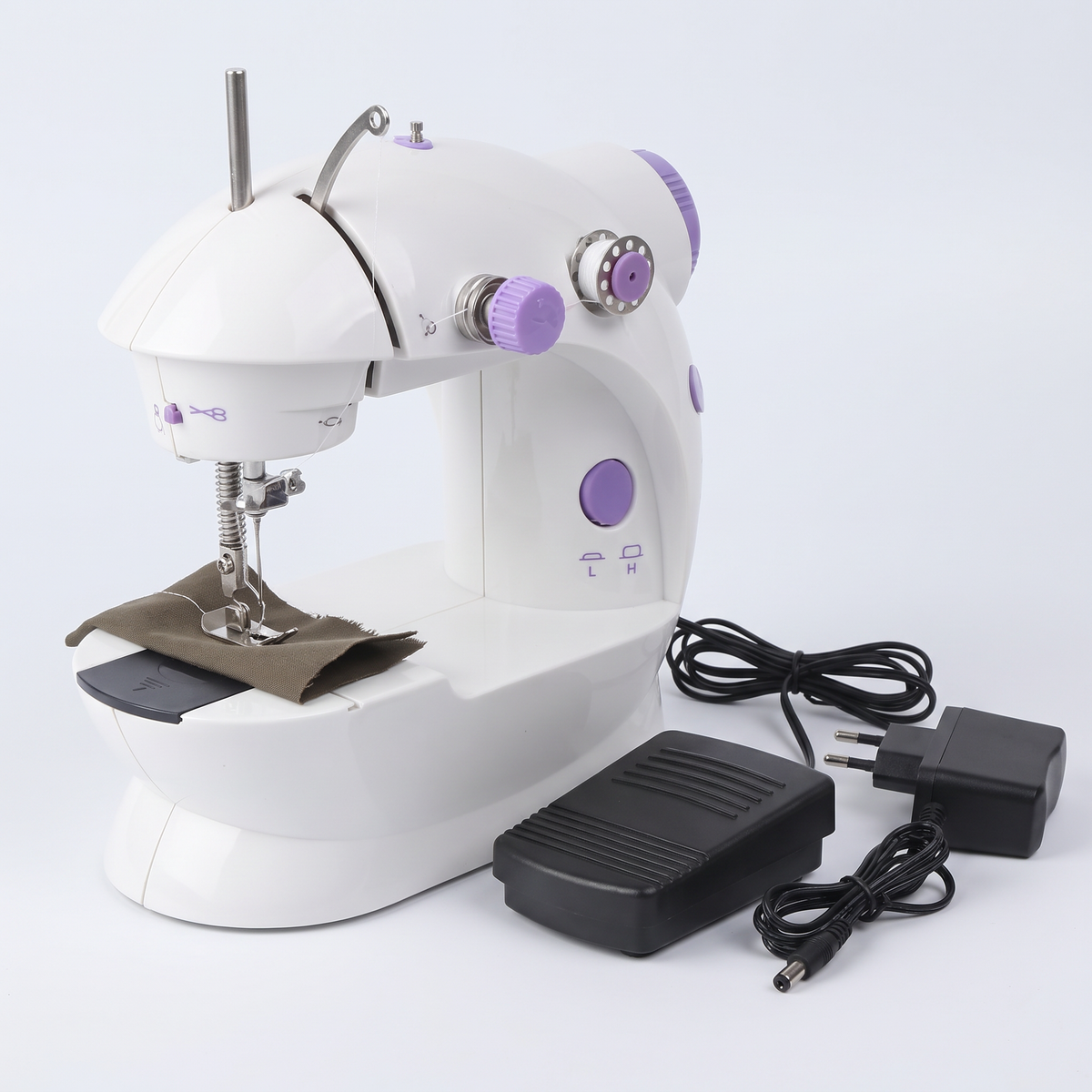 Mini máquina de coser con luz y pedal
